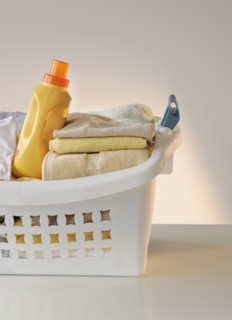 A laundry basket full of clothes.