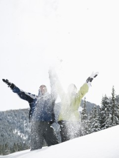 A couple outdoors in the snow
