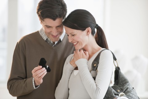 A couple looking at engagement rings.