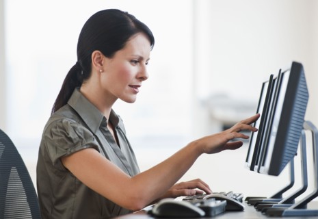 A businesswoman using a computer.