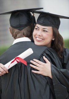 A young woman and young man graduating.