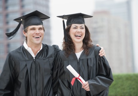 A young woman and young man graduating.