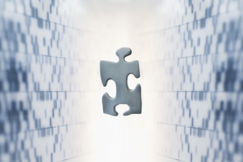 Puzzel piece against medical background.