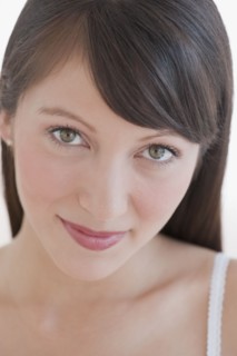 Woman looking into camera.