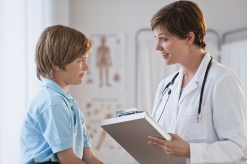 Female doctor with child