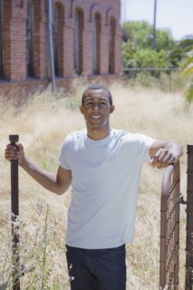 Young man at abandoned building