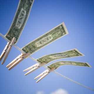 Dollars on clothes line