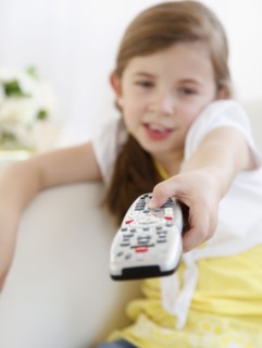Child with TV remote