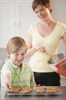 Mother and child baking