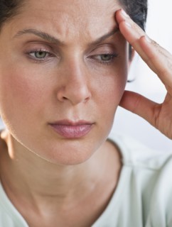 Woman with headache.