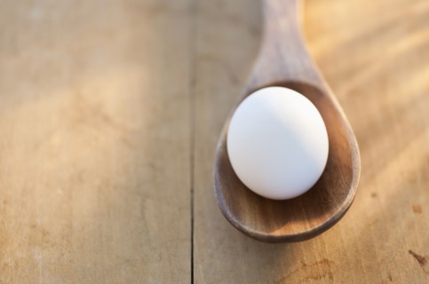 Egg in spoon.
