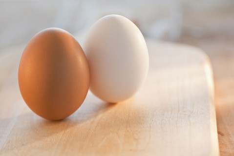 Brown and white eggs.