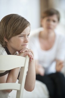 Mother talking with child.