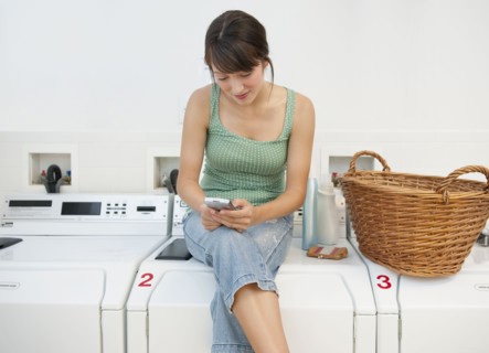 Woman in laundromat.