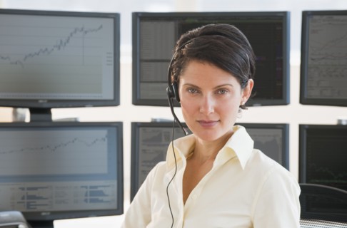 Female trader looking at camera.