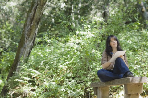 Young female in forest