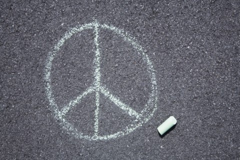 Peace sign on pavement
