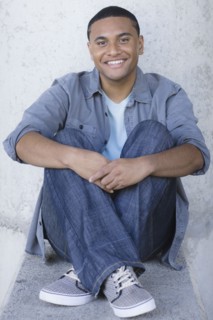 Young man sitting