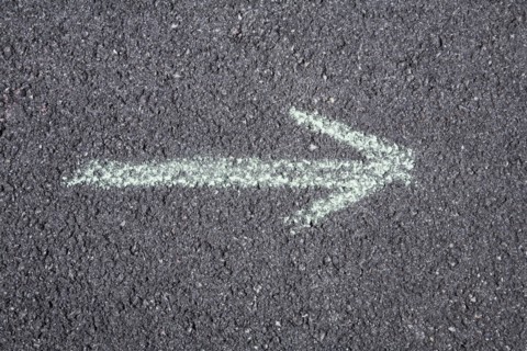 Arrow pointing right on pavement