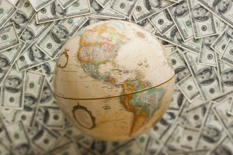 Globe on US dollars background