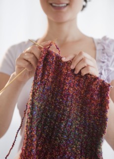 Woman knitting.