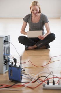 Women sitting while working on computer.