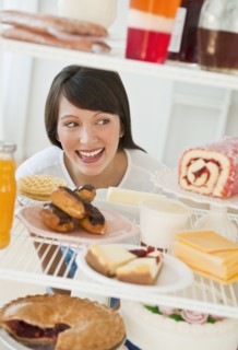Woman looking at sweets.