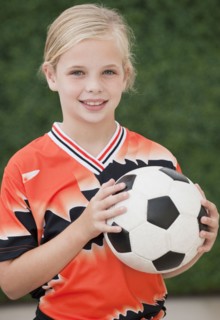 Child with soccer ball.