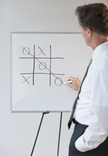 Businessman drawing concept for winning.
