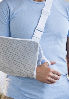 Man with arm in sling.