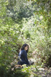 Young female in forest