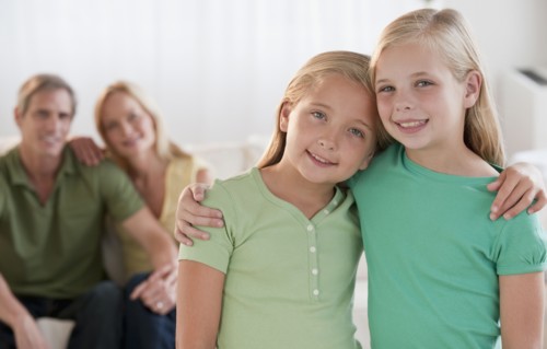 Happy sisters at home.