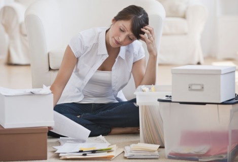 Woman organizing papers.
