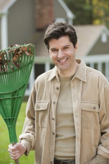 Man holding rake.