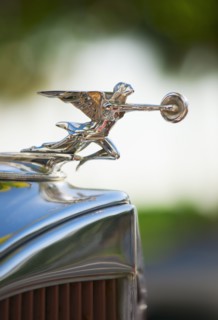 Hood ornament on classic car.