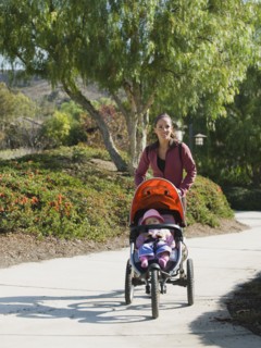 Woman jogging with stroller