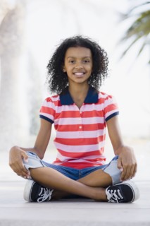 Girl sitting cross legged