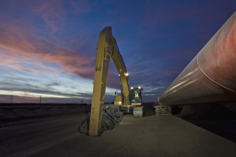 Heavy equipment beside pipeline