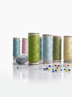 Spools of thread and pushpins
