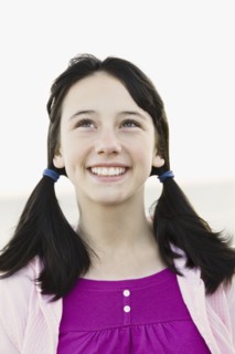 Young girl with ponytails