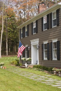 American flag on house.