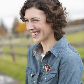 Woman smiling.