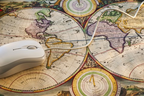 Maps and computer mouse.