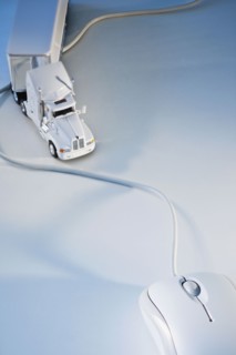 Computer mouse and toy truck.