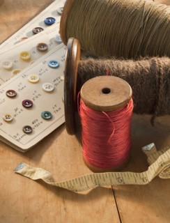Thread buttons and measuring tape.