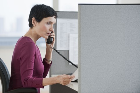 Woman talking on phone.