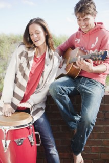 Couple playing instruments