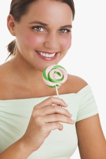 Woman holding lollipop