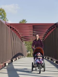 Woman pushing stroller