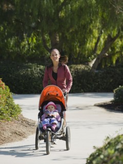 Woman jogging with stroller